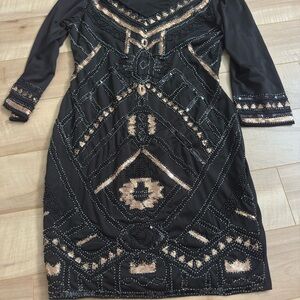 Elegant Black and Gold Embellished Dress